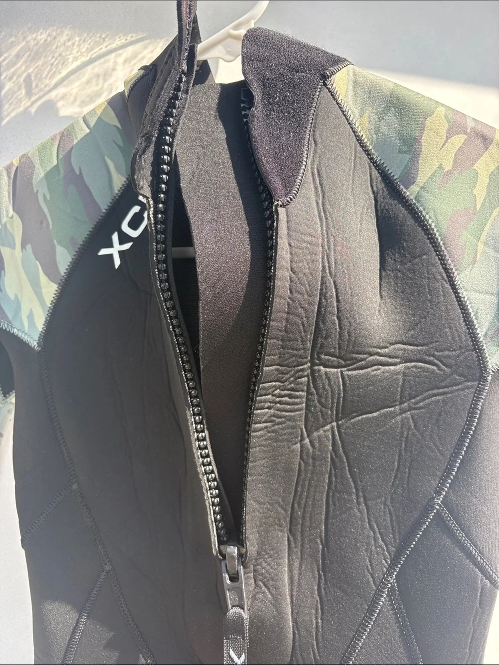 XCEL 3/2mm Boys Black Wetsuit with Camo Sleeves